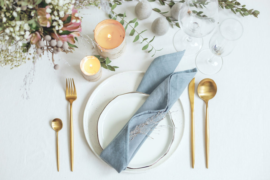 Blue & Gold Easter Dining Table. Image by Akasha via Shutterstock.