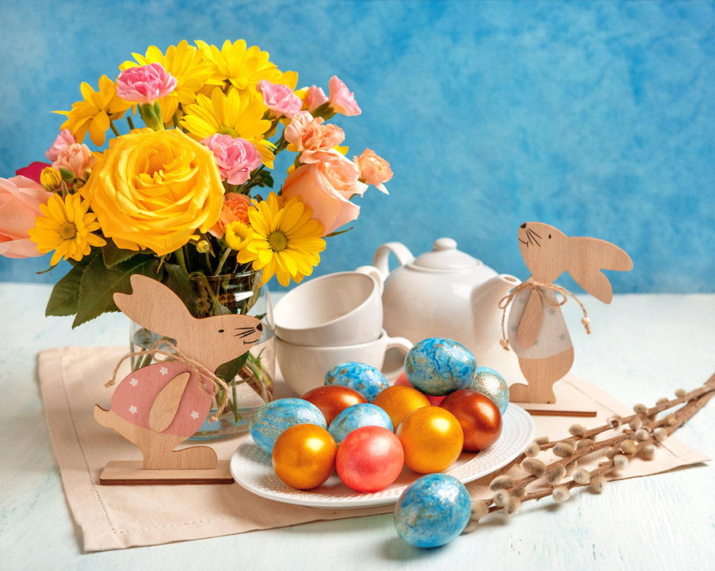 Easter table setting with metallic eggs. Image by Svetlana Khutornaia via Shutterstock.