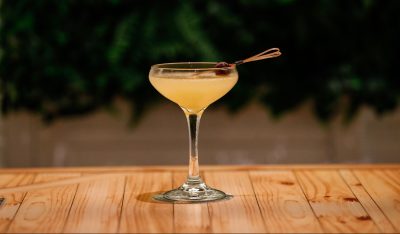 martini glass cocktail on wooden table