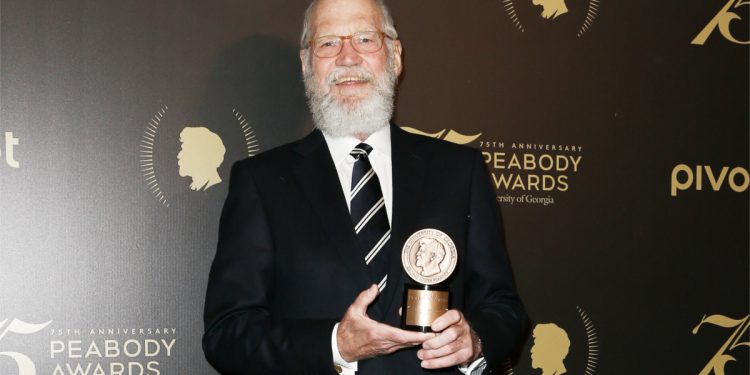 david letterman holding peabody award