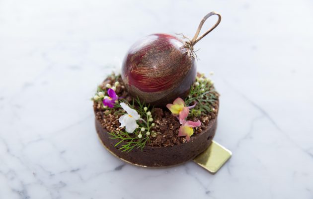 Bauble Tart - Fruit mince tart with brandy and spices, chocolate filling, speculaas crumb base. Chocolate bauble filled with cherry gel, fruit mince and tea dacquoise. Image: Supplied