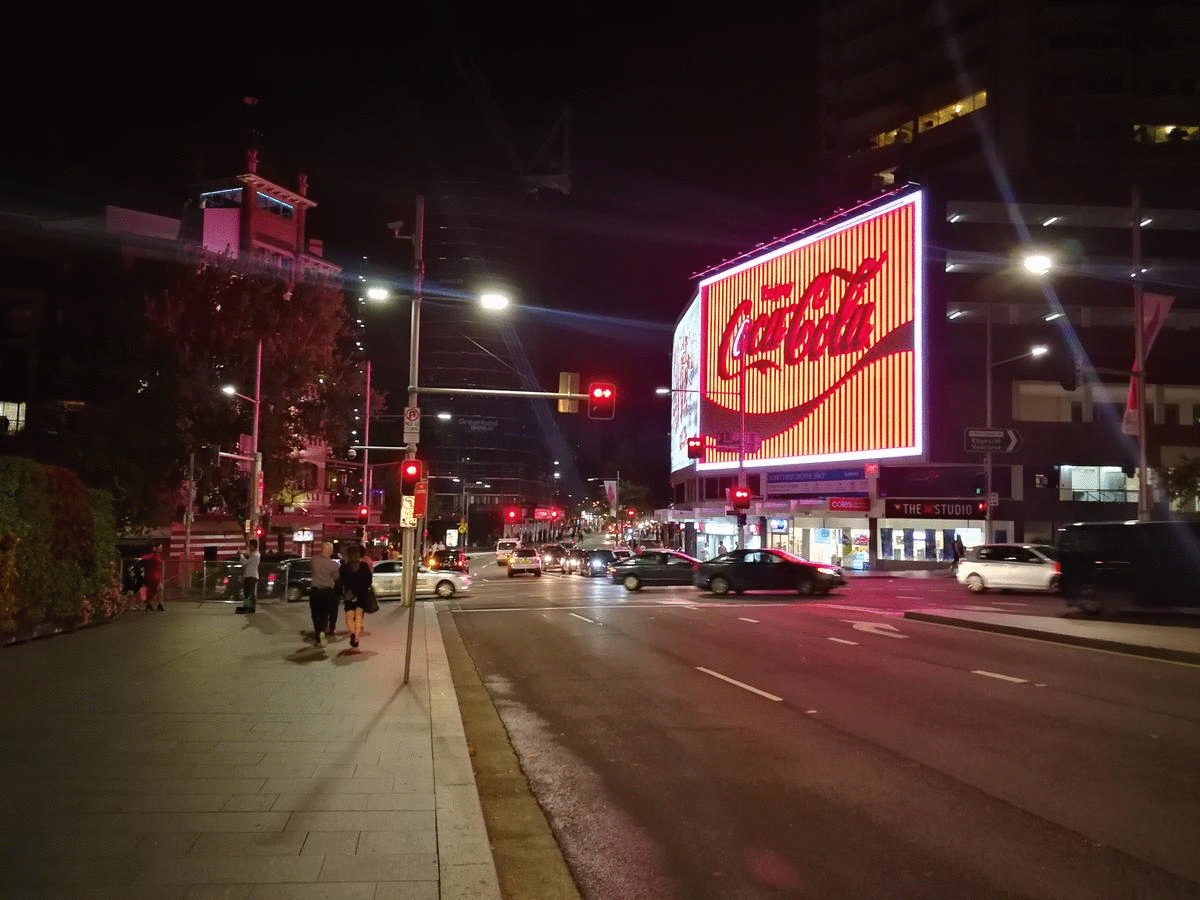 The famous Coca Cola neon sign at Kings Cross. Image: Christopher Kelly