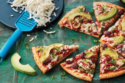 Dominos vegan cheese and pizza. Image: Supplied