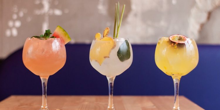 Cocktails. Photographed by Louis Hansel. Image via Unsplash