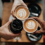 Coffees at cafe. Image by Natahn Dumlao via Unsplash.