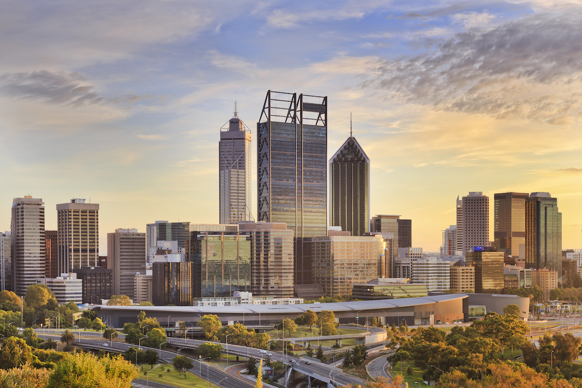 Perth City CBD sunset. Photographed by Taras Vyshnya. Image via Shutterstock