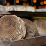 Bread in Common bread loaves. Photographed by Fiona Smallwood. Image via Unsplash