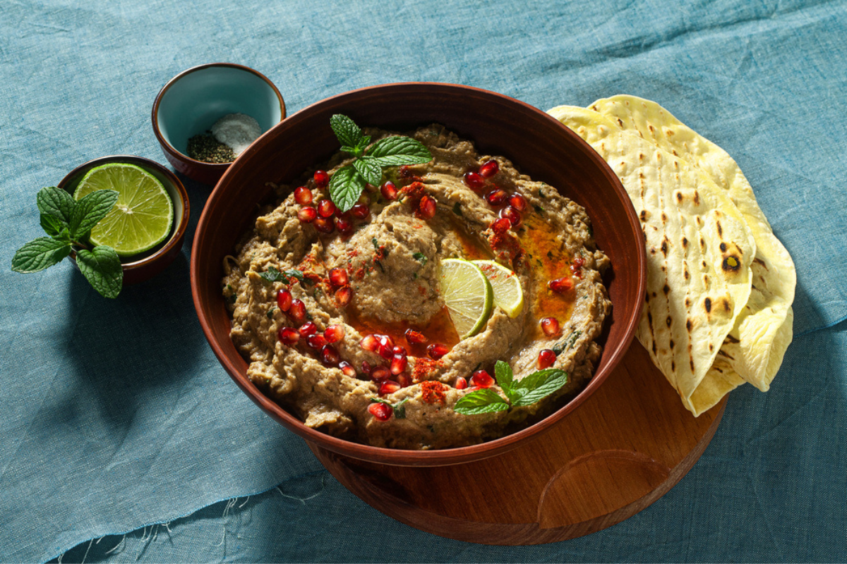 Grilled Hemp and Eggplant Baba Ganoush Recipe. Photographed by IriGri. Image via Shutterstock.