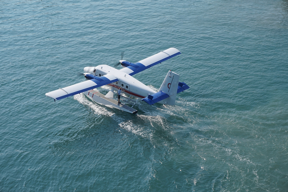 Seaplane on sea. Image by Anaducay via Shutterstock.
