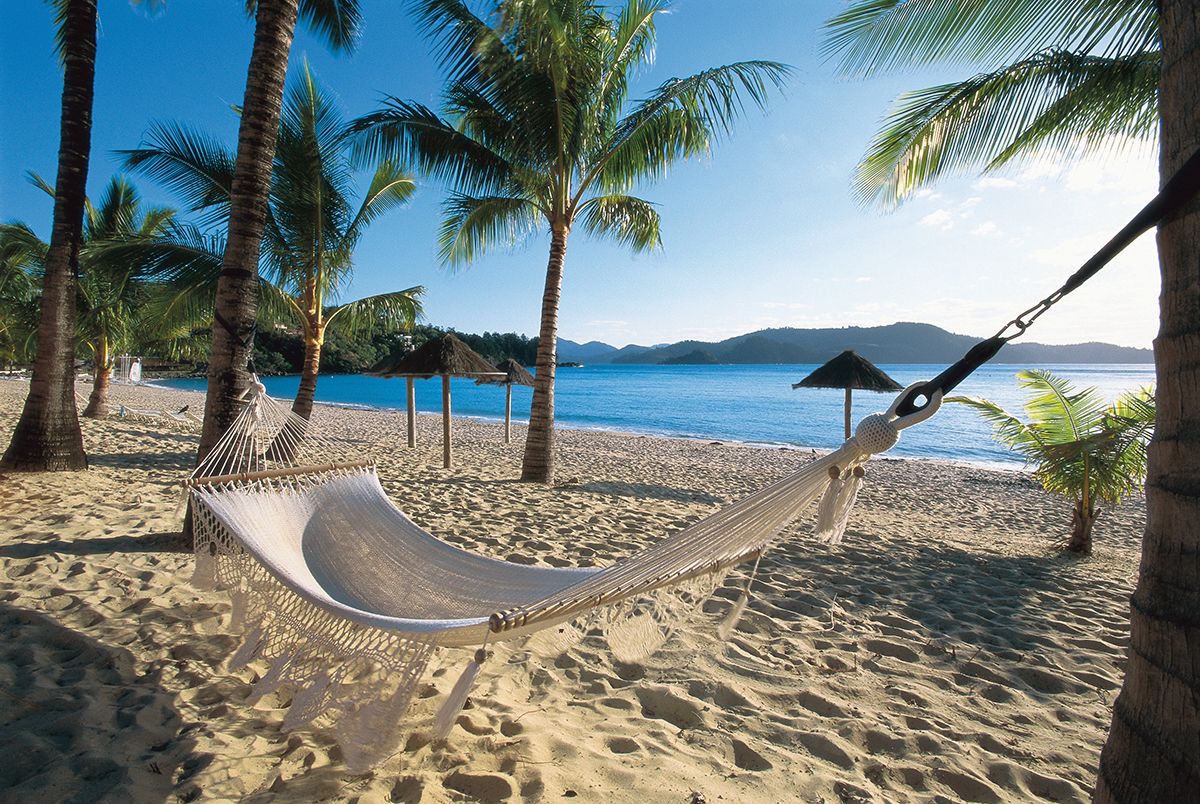 Beach Hammock, Catseye Bay. Hamilton Island. Supplied by Tourism and Events Queensland. Photographed by Paul Ewart.