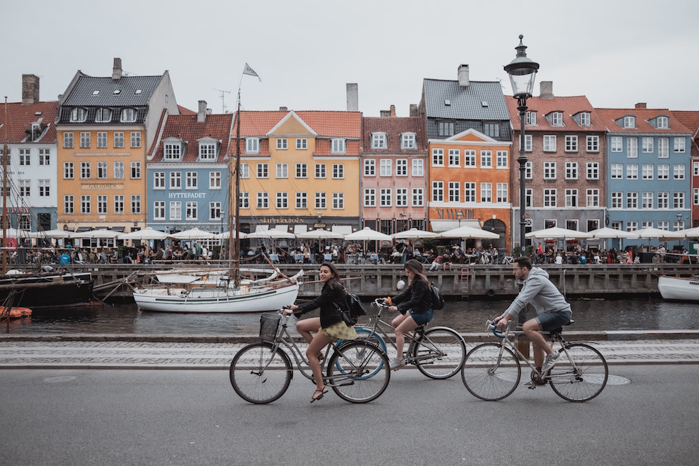 Cycling in Copenhagen. Image by Febiyan via Unsplash.