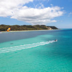 Parasailing. Image by Mark Higgins via Shutterstock.