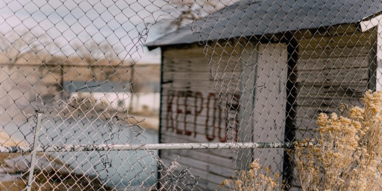 Keep out sign. Image by Clayton Cardinalli via Unsplash.
