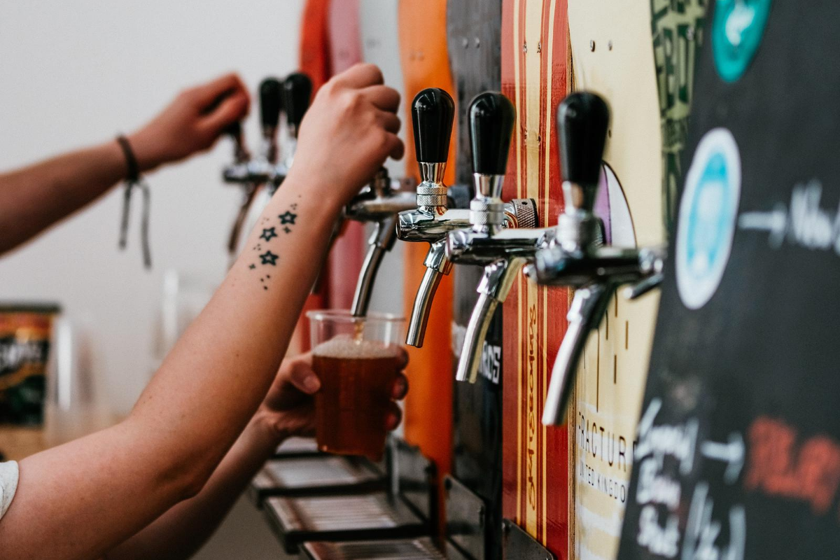 Beer Taps. Image by Adam Wilson via Unsplash.