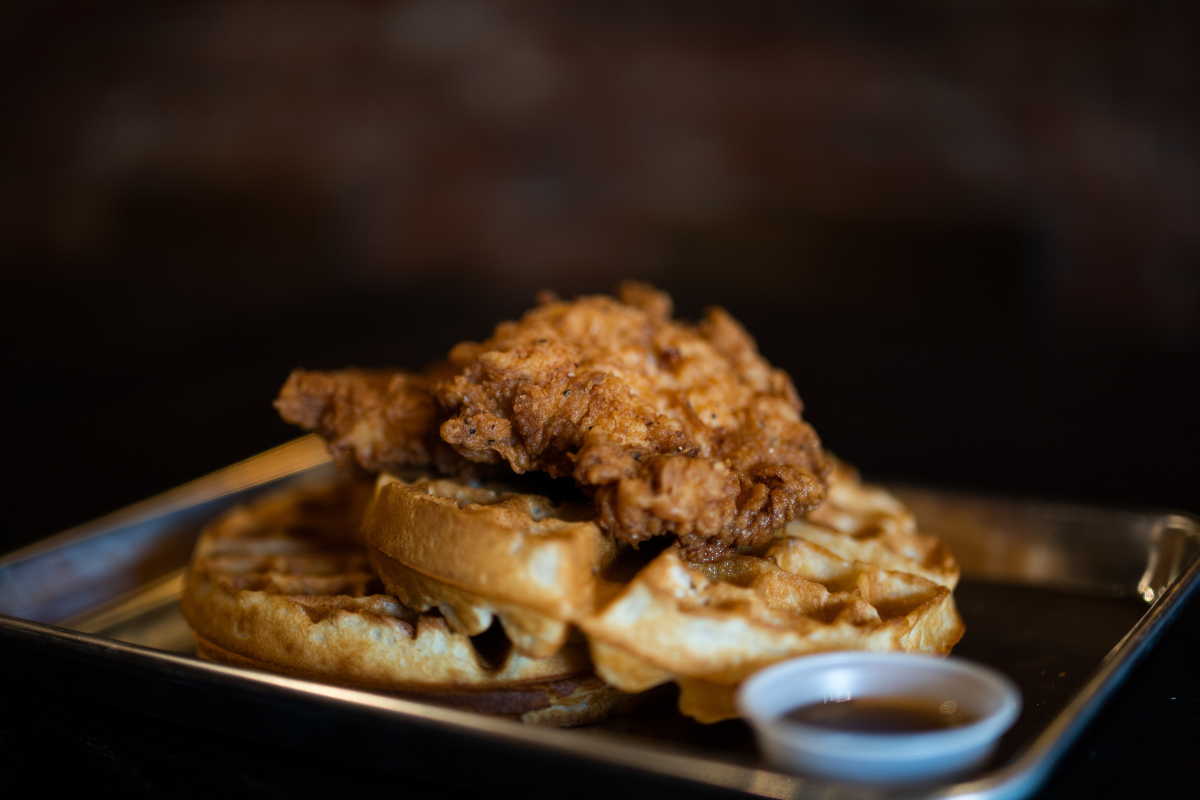 Where to Find Sydney's 6 Best Fried Chicken and Waffles. Fried chicken and waffles. Photographed by Miguel Dominguez. Image via Unsplash.