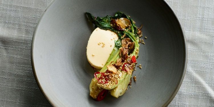 Steamed Egg Custard with Sesame Garlic Bok Choy. Photographed by Kristofer Paulsen. Image supplied.