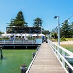 Jetty leading to The Boathouse Palm Beach, Sydney. Image: Destination NSW