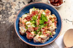 Creamy Bacon & Egg Sweet Potato Salad, Ribs and Sides by Adam Roberts. Image supplied