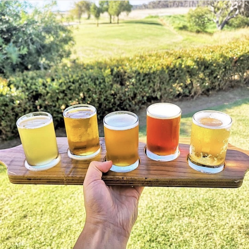 The tasting paddle at Cheeky Monkey. Image via Instagram.