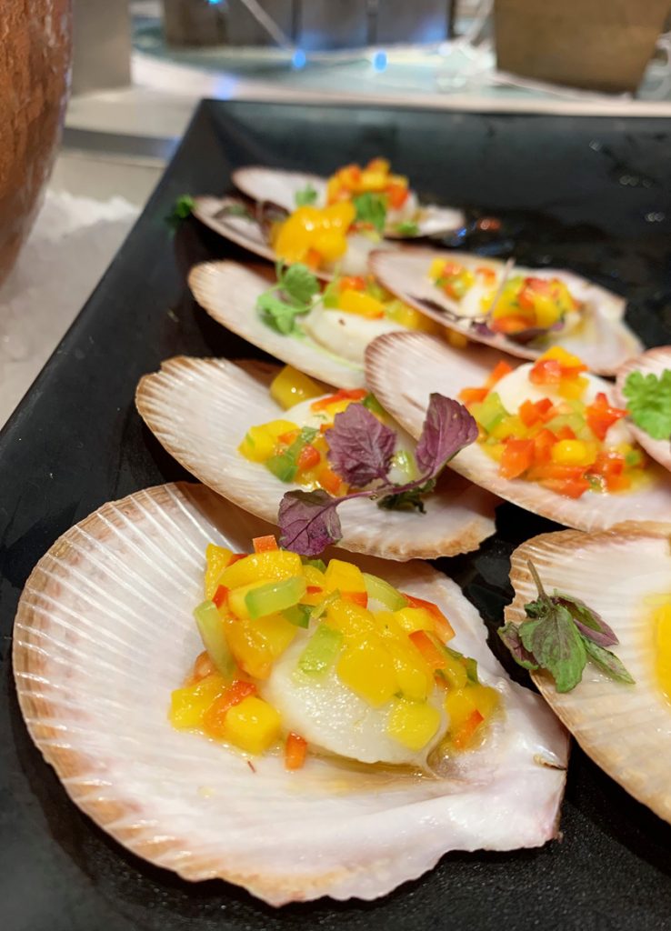 Scallops from the FEAST seafood buffet. Image via Rebecca Cherote for Hunter and Bligh.