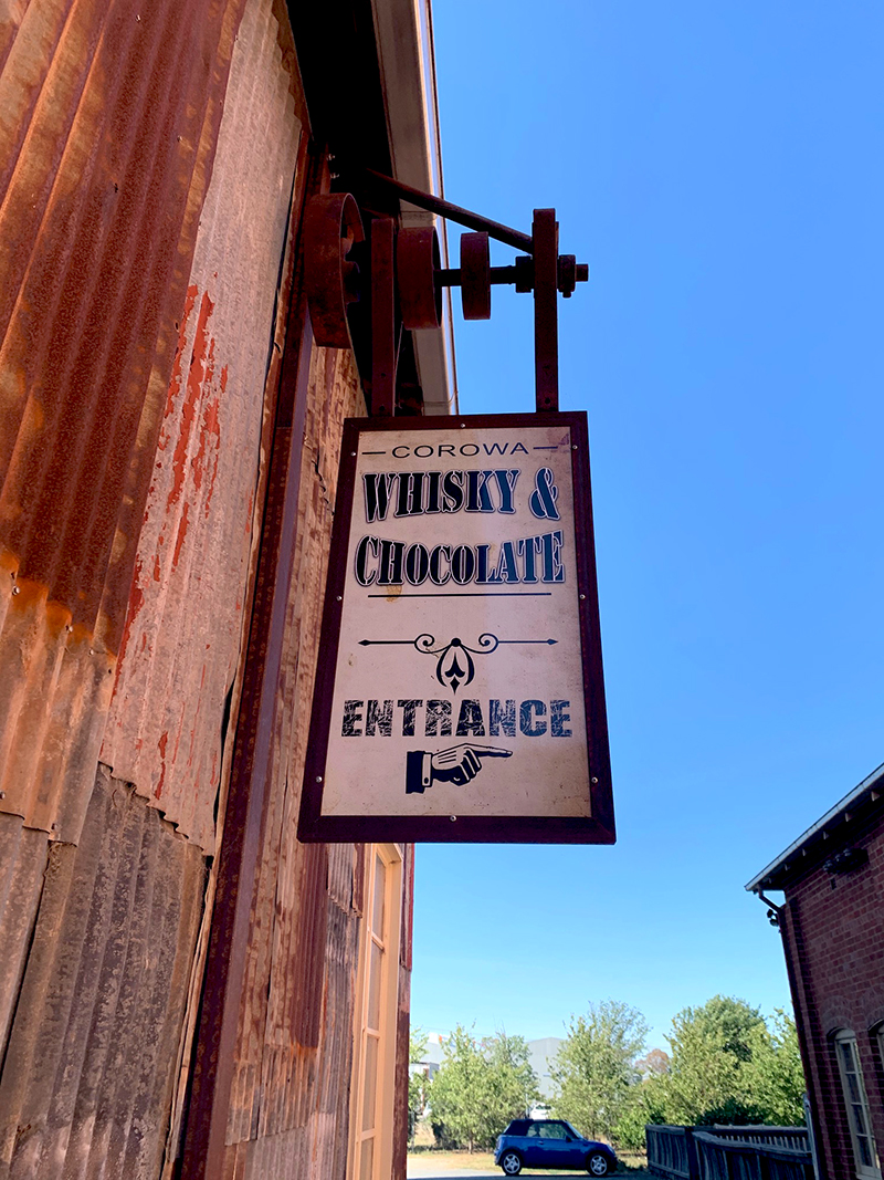 Corowa Whisky & Chocolate. Outdoor signage. Image via Rebecca Cherote for Hunter and Bligh