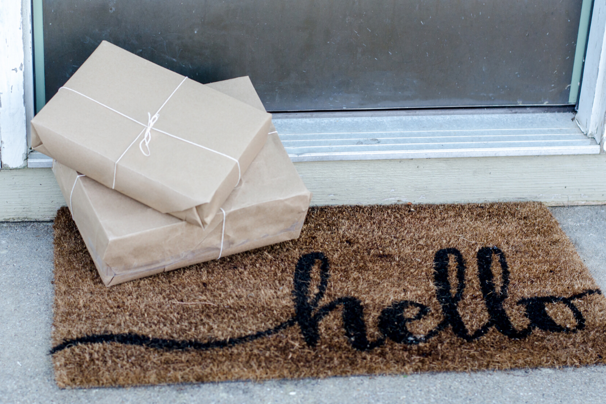 Packages front door. Photographed by iyd39. Image via Shutterstock