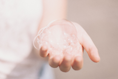 Hand bubbles. Photographed by Matthew Tkocz. Image via Unsplash