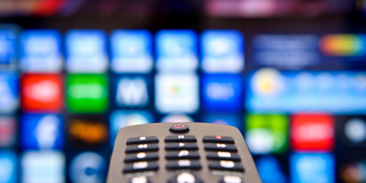 Television remote. Photographed by Rasulov. Image via Shutterstock.