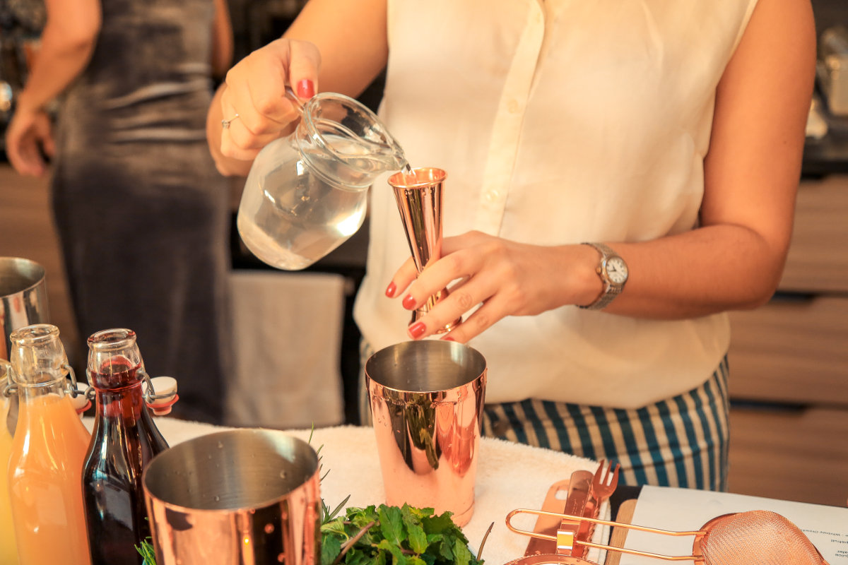 Cocktail making at home. Photographed by Athena Nadi. Image via Shutterstock