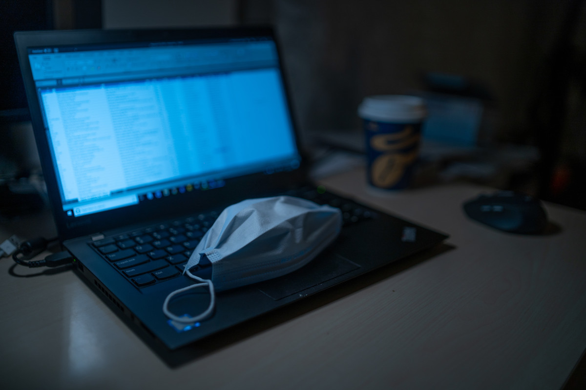 Face mask on laptop. Image: Dimitri Karastelev on Unsplash