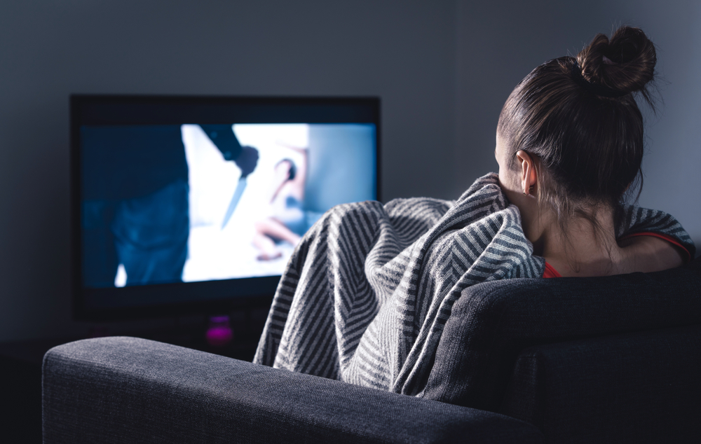Watching a thriller. Photographed by Tero Vesalainen. Image via Shutterstock