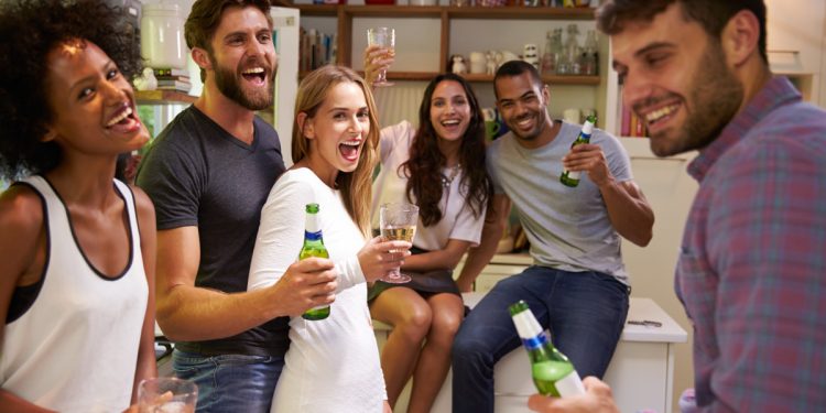 Home Party Alcohol. Photographed by Monkey Business Images. Sourced via Shutterstock