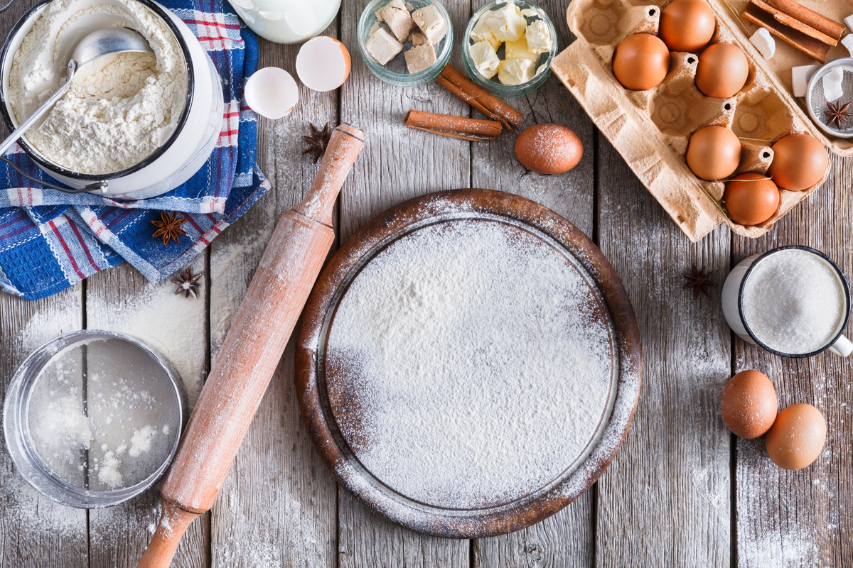 Cooking ingredients spread on a bench top