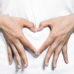 Gut health. Heart on stomach. Photographed by metamorworks. Image via Shutterstock