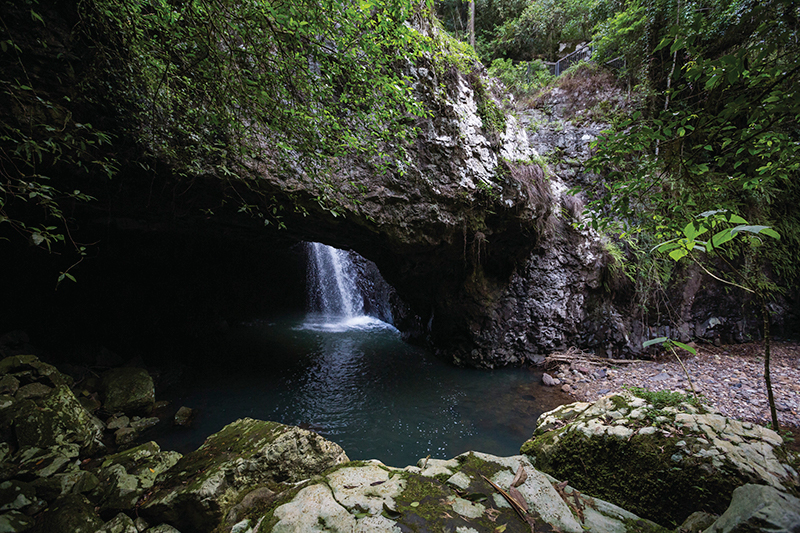 Natural Bridge Springbrook. Photographed by Set In Stone Media. Image via Tourism and Events Queensland