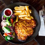 The Wharf Hotel Docklands Melbourne Chicken Parma. Australian Venue Co. Image supplied.