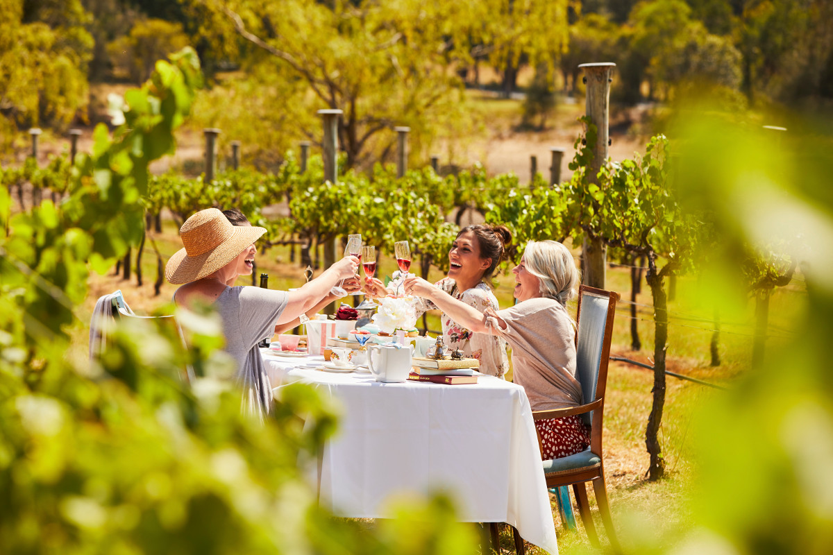 Friends enjoying a High Tea experience at Cambewarra Estate Winery, Bangalee. Image: Destination NSW
