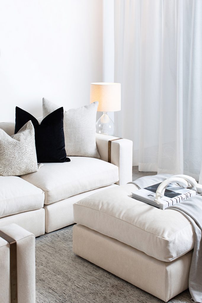Crafted Furniture white sofa and ottoman. Image supplied via Crafted Furniture