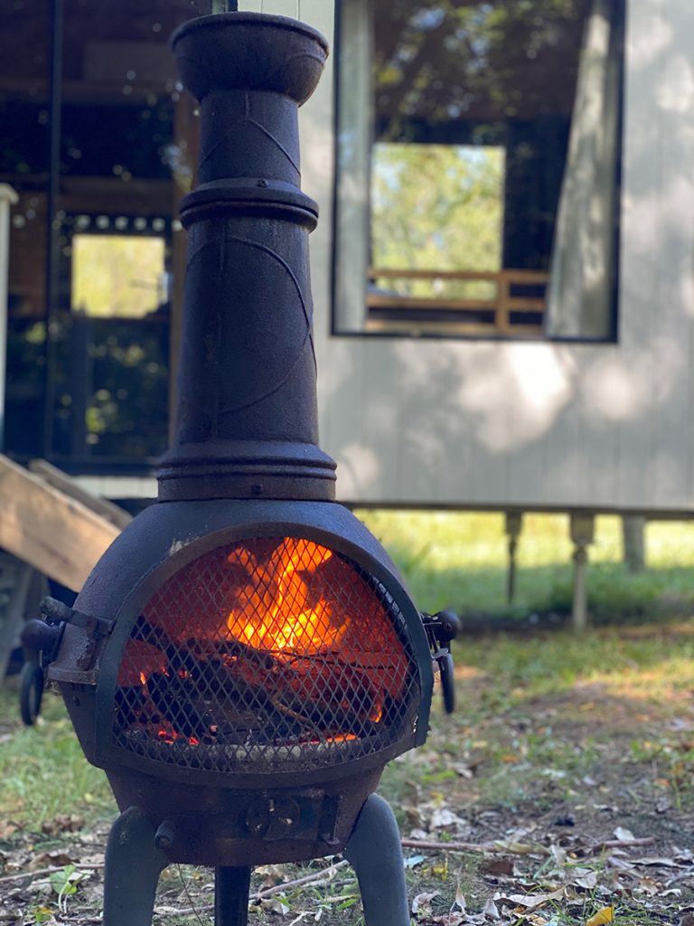 Kookaburra Park Garden Studio, Queensland, exterior and fire pit. Image supplied via Kookaburra Park