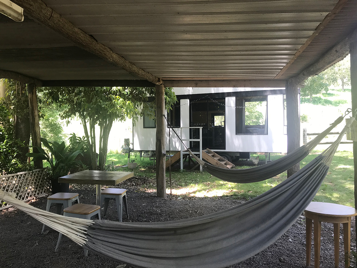 Kookaburra Park Garden Studio, Queensland, exterior and hammocks. Image supplied via Kookaburra Park