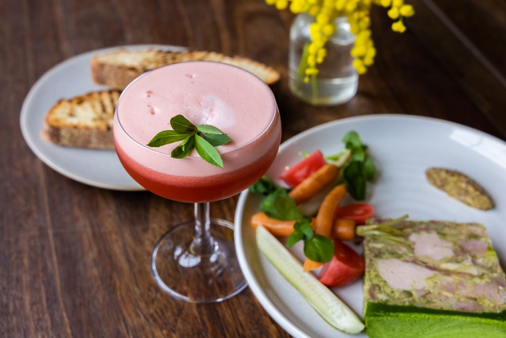 Tangerine Spritz ($20) paired with Berkshire pork terrine, mustard and preserved vegetables. Chiswick In Boom. Photographed by Hugh O'Brien