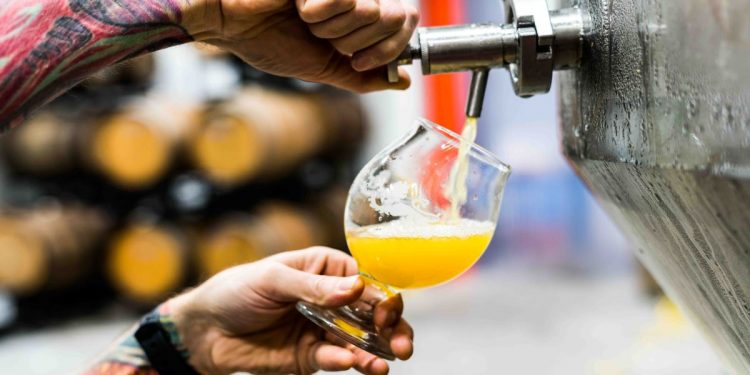 Beer. Photographed by Evan Dvorkin. Image via Unsplash.