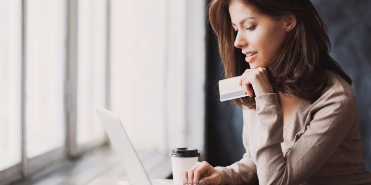 Woman online shopping. Photographed by Kite_rin. Image via Shutterstock.