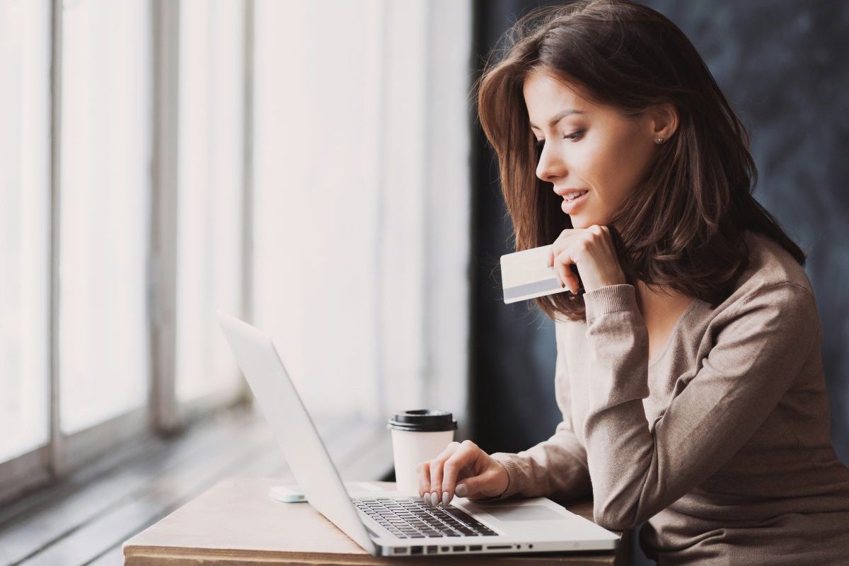 Woman online shopping. Photographed by Kite_rin. Image via Shutterstock.