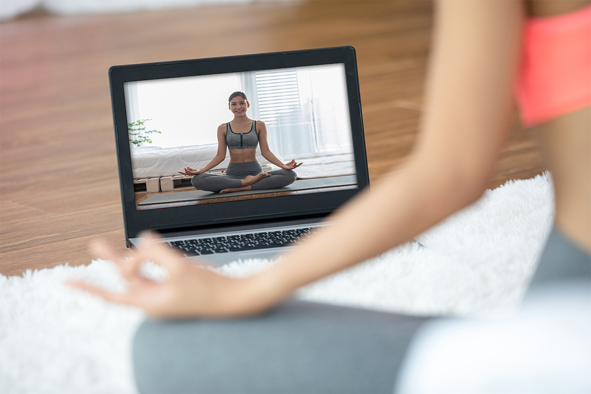 Yoga Class Online. Photographed by Yotlan Jaowattana. Image via Shutterstock.