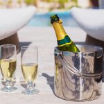 Champagne By The Pool. Image Sourced From Shutterstock, Photographed By Kaspars Grinvalds.