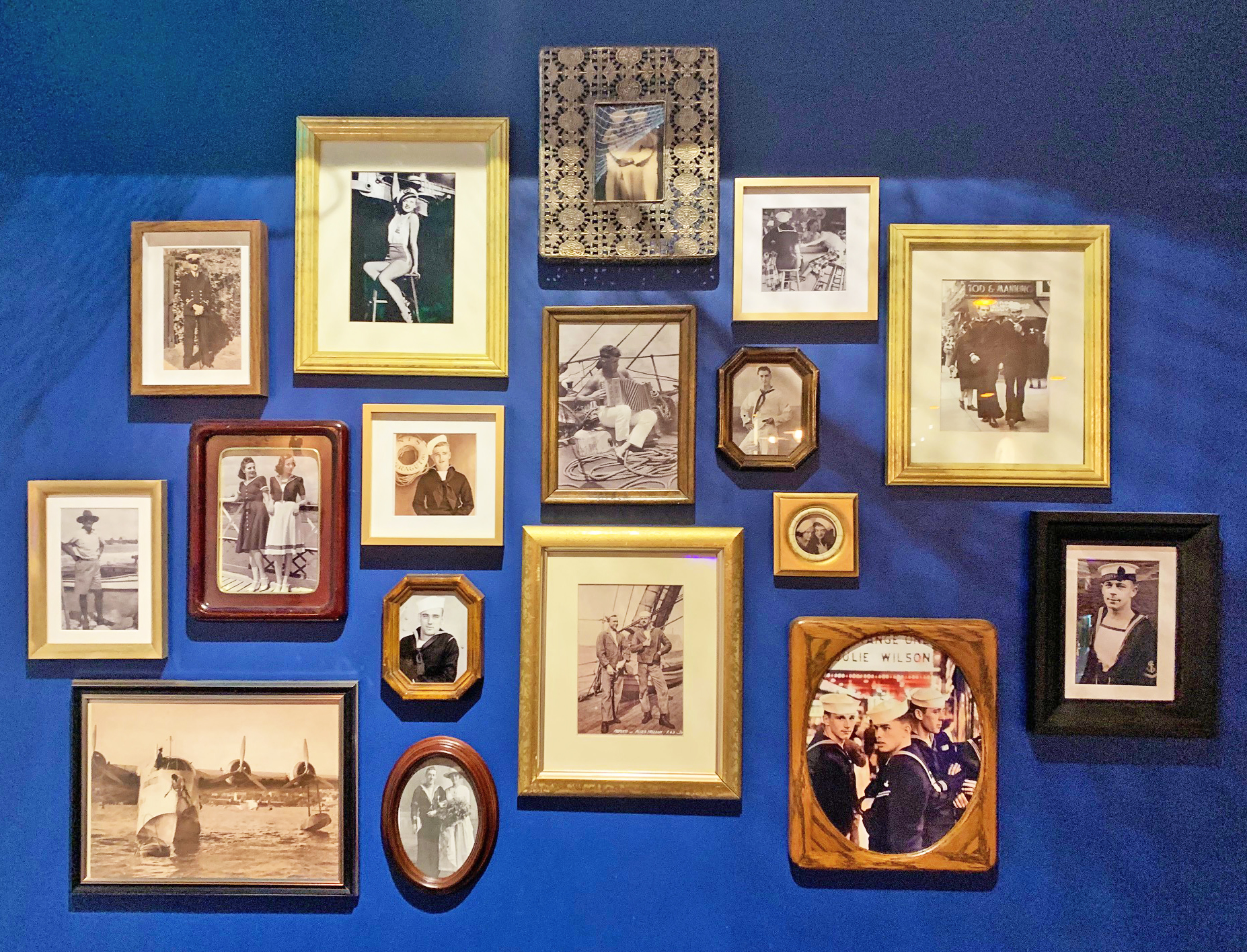The Sailor Bar & Kitchen feature wall of naval photos gifted by the Northbridge community. Image owned by Hunter and Bligh.