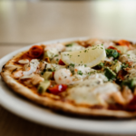 Close-up of a Zachary's Pizza from Zachary's Gourmet Pizza Bar in Noosa, Queensland. Image supplied via Zachary's Gourmet Pizza Bar.