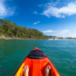 Kayaking at Noosa National Park in Noosa, Queensland.