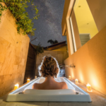 Outdoor bath in Alaya Verde's Gold Room in Noosa, Queensland. Image supplied via Alaya Verde.